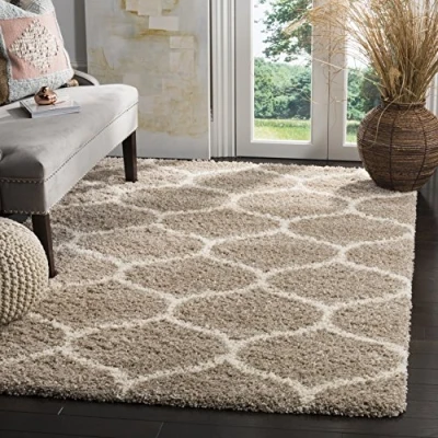 Abbildung von SAFAVIEH Zottelig Teppich für Wohnzimmer, Esszimmer, Schlafzimmer Hudson Shag Collection, Hoher Flor, Beige und Elfenbein, 91 X 152 cm