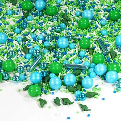 Abbildung von Streusel GLÜCK Dino Park Mix 90g Tortendeko Dinosaurier weiss grün blau bunte Sprinkles Zuckerstreusel perfekt für Kindergeburtstag Geburtstag Junge Cupcakes Muffins Cakepops
