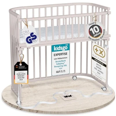 Abbildung von babybay Boxspring XXL Beistellbett aus massivem Buchenholz/kompakt &amp; verwandelbar/Kinderbett Höhe stufenlos verstellbar/mitwachsendes Babybett (beige lackiert) / inkl. Matratze, Gitter, Rollen