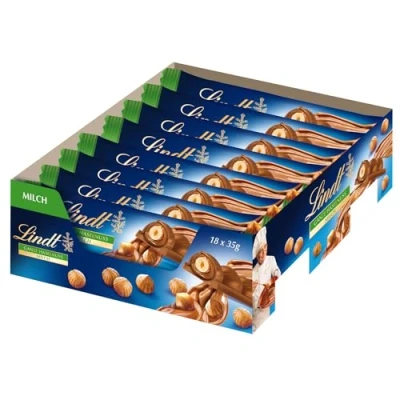 Abbildung von Lindt Schokolade NUSS DELUXE Riegel Vollmilch Haselnuss 18 x 35g Geröstete Haselnüsse in feiner Nusscrème umhüllt von feinschmelzender Pralinengeschenk Schokoladengeschenk