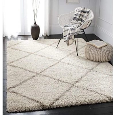 Abbildung von SAFAVIEH Zottelig Teppich für Wohnzimmer, Esszimmer, Schlafzimmer Hudson Shag Collection, Hoher Flor, Elfenbein und Beige, 91 X 152 cm