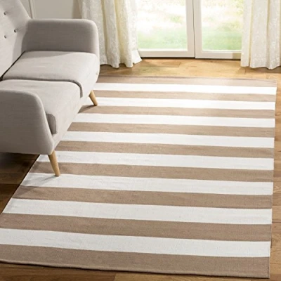 Abbildung von SAFAVIEH Modern Teppich für Wohnzimmer, Esszimmer, Schlafzimmer Montauk Collection, Kurzer Flor, Sand und Elfenbein, 122 X 183 cm