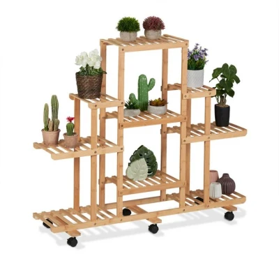 Abbildung von relaxdays Blumenständer Bambus Pflanzenregal mit Rollen