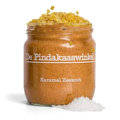 Abbildung von De Pindakaaswinkel Erdnussbutter / Karamell Meersalz 2x420g (840g) peanut butter „Die leckerste der Niederlande“