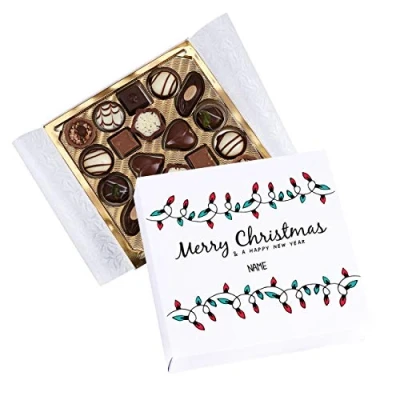 Abbildung von Herz &amp; Heim® Lindt Mini Pralinés Merry Christmas and a happy New Year mit Ihrem Wunschnamen