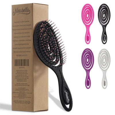 Abbildung von Ninabella Haarbürste ohne Ziepen für Damen und Herren Entwirrbürste auch Locken &amp; Lange Haare Einzigartige Profi Detangler Bürste mit Spiralfeder Schwarz Pink