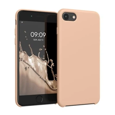 Abbildung von kwmobile Hülle kompatibel mit Apple iPhone SE (2022) / (2020) 8 7 Silikon Handy Case Handyhülle weiche Oberfläche kabelloses Laden Pastell Pfirsich