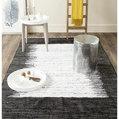 Abbildung von SAFAVIEH Modern Teppich für Wohnzimmer, Esszimmer, Schlafzimmer Montauk Collection, Kurzer Flor, Elfenbein und Schwarz, 152 X 244 cm