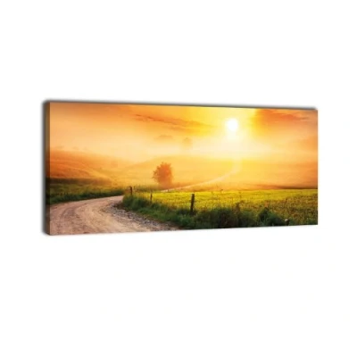 Abbildung von wandmotiv24 Leinwandbild Panorama Nr. 315 Weg im Morgendunst 100x40cm, Keilrahmenbild, Bild auf Leinwand, Landstrasse Sonnenaufgang Landschaft