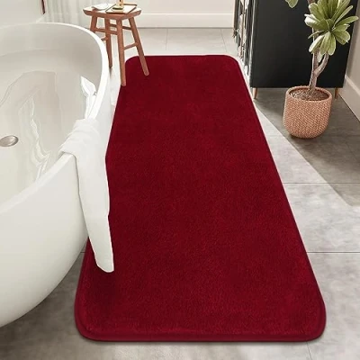 Abbildung von Rururug Badezimmermatte Weiche Mikrofaser Badematte, Badezimmerteppich Groß Bad Teppich 120x50cm, rutschfeste Waschbar Badvorleger, Rot