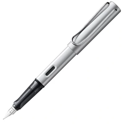Abbildung von Lamy AL star whitesilver Füller Füllhalter mit ergonomischem Griff &amp; polierter Stahlfeder in Strichbreite M leichtes Aluminiumgehäuse inkl. Tintenpatrone T 10 blau Rechtshänder