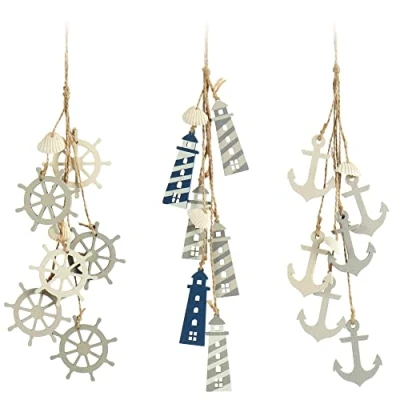 Abbildung von com four® 3X Hängedeko Maritim Dekoration zum Aufhängen Steuerrad, Anker und Leuchtturm mit Muscheln aus Holz (3 Stück grau/weiß/blau)