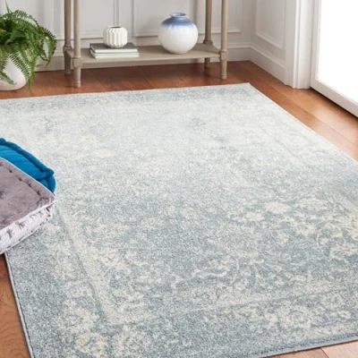 Abbildung von SAFAVIEH Distressed Teppich für Wohnzimmer, Esszimmer, Schlafzimmer Adirondack Collection, Kurzer Flor, Schiefer und Elfenbein, 122 X 183 cm
