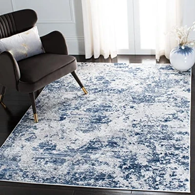 Abbildung von SAFAVIEH Modern Teppich für Wohnzimmer, Esszimmer, Schlafzimmer Amelia Collection, Kurzer Flor, Blau, 91 X 152 cm
