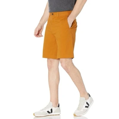 Abbildung von Amazon Essentials Herren Klassisch Geschnittene Chinoshorts, 23 cm, Muskat, 38W