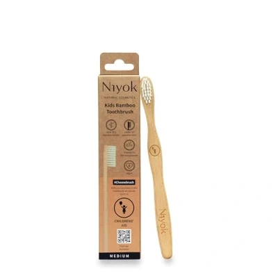 Abbildung von Niyok® Bambus Zahnbürste &quot;KINDER IN NOT&quot; 1er aus Mittelweiche Borsten Natürliche Holzzahnbürste Nachhaltige Zahnbürsten Toothbrush Plastikfrei &amp; Vegan