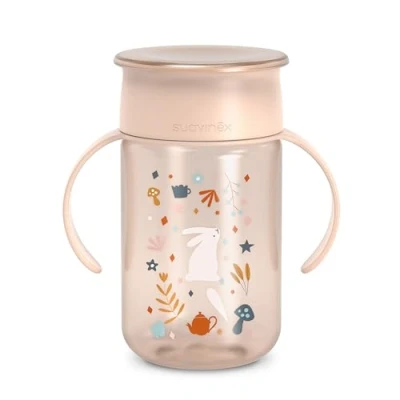 Abbildung von Suavinex, Trinklernbecher für Babys, mit auslaufsicherer Scheibe, Magic Cup Rand, auslaufsicher, 360 , abnehmbare Griffe, hygienischer Deckel, spülmaschinenfest, 340 ml, Wonderland, Rosa