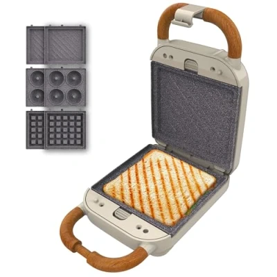 Abbildung von Cecotec Sandwichmaker Rock&#039;Ntoast Retro One Beige. Drei austauschbare Platten, Design, Rockstone Beschichtung, 700W, Leuchtanzeige, rutschfeste Basis, kühler Griff, Verschlusszange