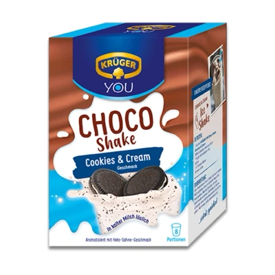 Abbildung von KRÜGER YOU Choco Shake Cookies &amp; Cream, Schokoladiger Genuss in heiß kalt, Schoko Milchshake mit Cream Geschmack und echten Keksstücken, 144 g (8 x 18 Sachets)