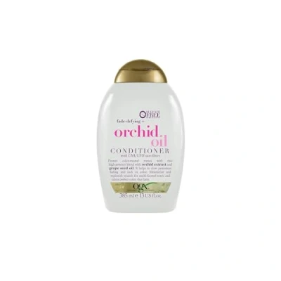 Abbildung von OGX Colour Protect Orchid Oil Conditioner (385 ml), schützende Haarspülung mit Orchideenextrakt &amp; Traubenkernöl, intensive Haarpflege Spülung für coloriertes Haar UV Schutz