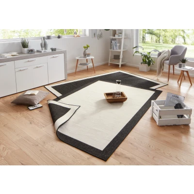 Abbildung von NORTHRUGS In und Outdoor Teppich Panama 120x170cm Wendeteppich Wetterfest Modernes Uni Design mit Bordüre Läufer für Balkon Terrasse Garten Wintergarten Wohnzimmerteppich Wasserfest, Schwarz Creme
