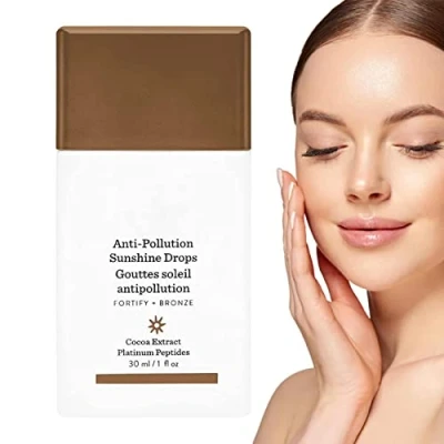 Abbildung von Drunk Elephant Bronzi Drops Serum Liquid Bronzer Cream, Anti Pollution Sunshine Serum, Bronzing für Gesicht und Körper, 30 ml