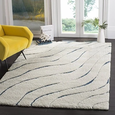 Abbildung von SAFAVIEH Zottelig Teppich für Wohnzimmer, Esszimmer, Schlafzimmer Florida Shag Collection, Hoher Flor, Creme und Blau, 122 X 183 cm