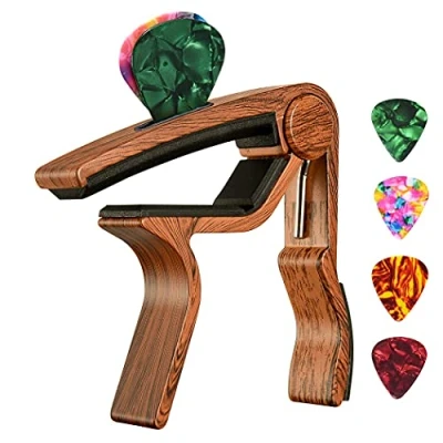 Abbildung von Kapodaster für Gitarre, Ukulele, Mandoline, Banjo aus Palisander mit Plektrenhalter und Plektren