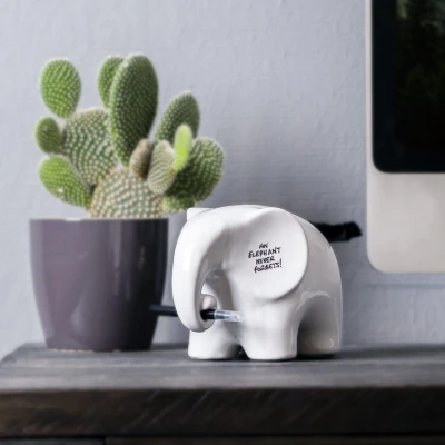 Abbildung von Memo Elefant mit Stift