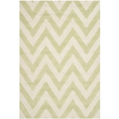 Abbildung von SAFAVIEH Modern Teppich für Wohnzimmer, Esszimmer, Schlafzimmer Cambridge Collection, Kurzer Flor, Hellgrün und Elfenbein, 122 X 183 cm