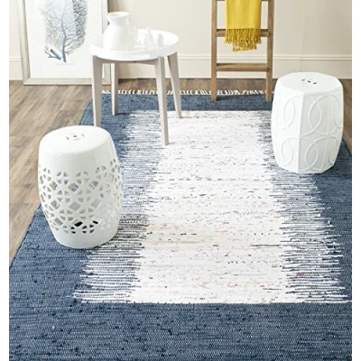 Abbildung von SAFAVIEH Modern Teppich für Wohnzimmer, Esszimmer, Schlafzimmer Montauk Collection, Kurzer Flor, Elfenbein und Marineblau, 91 X 152 cm