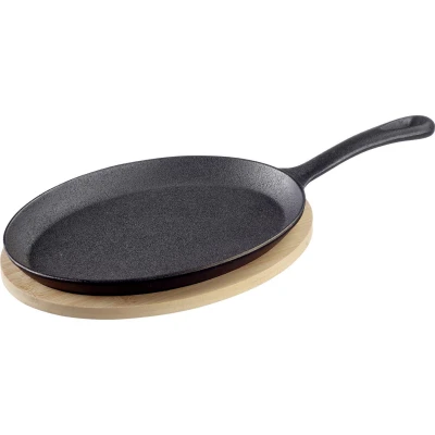 Abbildung von Westmark Gusseiserne Pfanne Tapas + Friends Gusseisenpfanne für alle Herdarten geeignet, auch Induktion und Grill, Gusspfanne inkl. Bambus Untersetzer Eisen, 500 ml