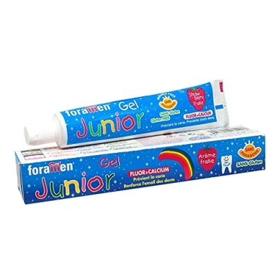 Abbildung von Zahnpasta für kleine Kinder Erdbeereich · Fluor + Calcium warnt Karies vor schützt den Zahnschmelz Glutenfrei