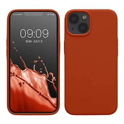 Abbildung von kwmobile Hülle kompatibel mit Apple iPhone 13 Silikon Handy Case Handyhülle weiche Oberfläche kabelloses Laden Rusty Orange