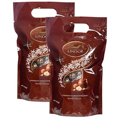 Abbildung von Lindt LINDOR Schokoladen Kugeln Haselnuss 1 kg Beutel, wiederverschließbar ca. 80 Milch Schokolade Großpackung, Pralinen Geschenk, Schokoladengeschenk (3 x kg)
