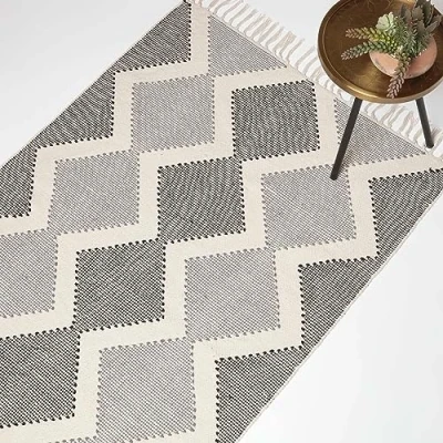 Abbildung von Homescapes Malmö Ethno Teppich schwarz Creme grau 90x150 cm, Fransen handgewebt, Struktur Baumwolle
