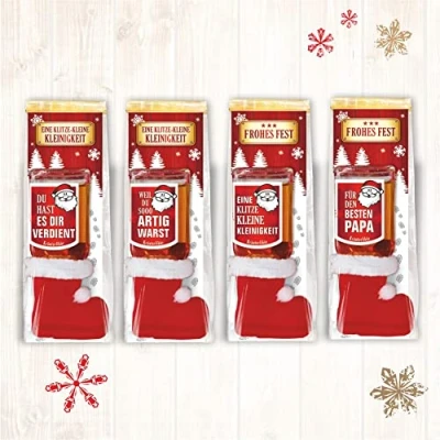 Abbildung von 4er Set Weihnachtsliköre: Weihnachtsüberraschung Amarena Kirsch Likör mit Stiefel und lustigen Sprüchen Liköre zu Weihnachten in schöner Geschenkverpackung