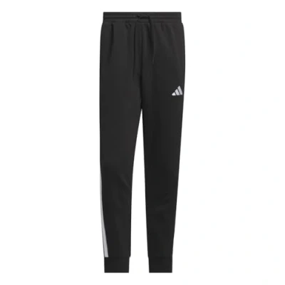Abbildung von adidas Sportswear Essentials 3STRIPES Jogginghose, Herren, Größe: Small, Black/white