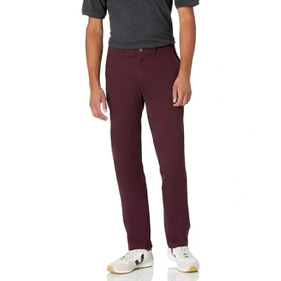 Abbildung von Amazon Essentials Herren Lässige Stretch Chinohose mit sportlicher Passform (in Übergrößen erhältlich), Burgunderrot, 31W / 32L