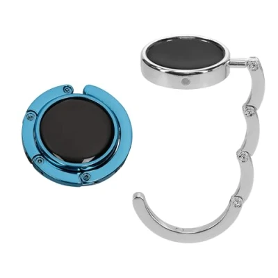 Abbildung von kwmobile Taschenhalter für Tisch 2X Faltbare Antirutsch Handtaschenhalter Haken Taschen Aufhänger Geschenkidee Gadgets Frauen Taschenhaken Set in Silber Dunkelblau