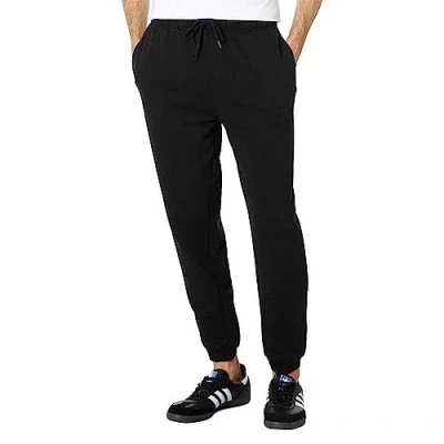 Abbildung von Hurley Herren OAO Solid Fleece Jogger Hose, Schwarz, L