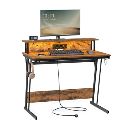 Abbildung von VASAGLE Schreibtisch, Gaming Tisch mit eingebauter Steckdosenleiste, Computertisch, Monitorständer für 2 Monitore, Schlafzimmer, 60 x 100 76 cm, vintagebraun LWD191K01