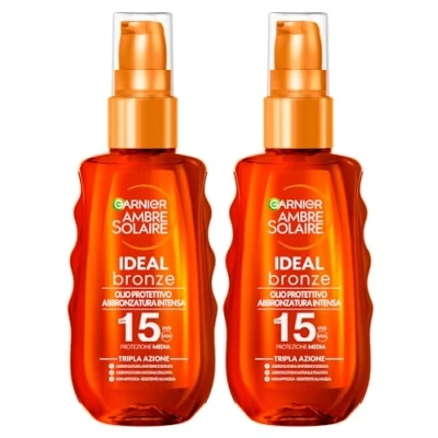Abbildung von Garnier Ambre Solaire Ideal Bronze, Intensive Bräunungsöl, Dreifachwirkung, LSF 15, mittlerer Schutz, 2 Flaschen à 150 ml