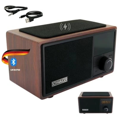 Abbildung von SCHWAIGER 715729 Analoger Radiowecker QI Ladestation UKW FM Bluetooth Lautsprecher Musikbox Radio AUX Micro SD Wireless Charger Smart Wecker Holzoptik
