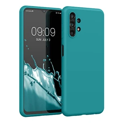 Abbildung von kwmobile Hülle kompatibel mit Samsung Galaxy A13 4G weiches TPU Silikon Case Cover geeignet für kabelloses Laden Petrol matt