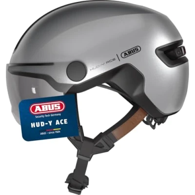 Abbildung von ABUS Stadthelm HUD Y ACE stylischer Fahrradhelm mit Visier und magnetischem, aufladbarem LED Rücklicht für Damen Herren Silber, Größe S