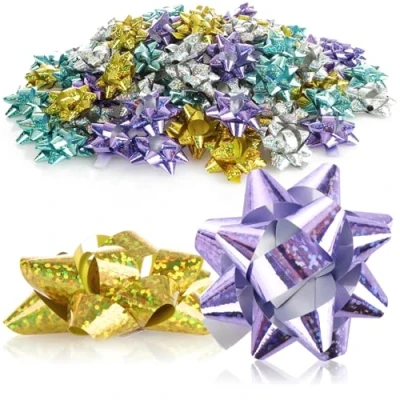Abbildung von com four® 100x Geschenkschleife in tollen Farben Selbstklebende Fertigschleife mit Glitzer zur Dekoration von Geschenken zu Weihnachten und Hochzeiten (100 Stück 4 Farben)
