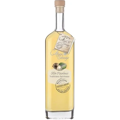 Abbildung von Alpenschnaps Alte Haselnuss Fasslagerung (0,5l) Milder Schnaps Nuss mit Rezeptur aus dem Alpenland Traditionell gereifter leichter Holznote 33 % Vol.