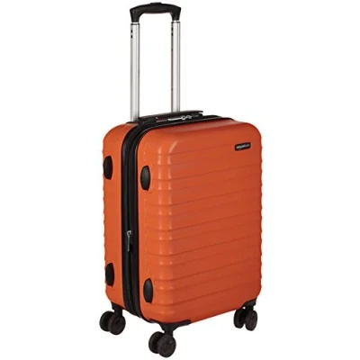 Abbildung von Amazon Basics Handgepäck Koffer, ABS Hartschale, Erweiterbarer Trolley mit 4 Drehbaren Rädern, 55 cm, Naranja