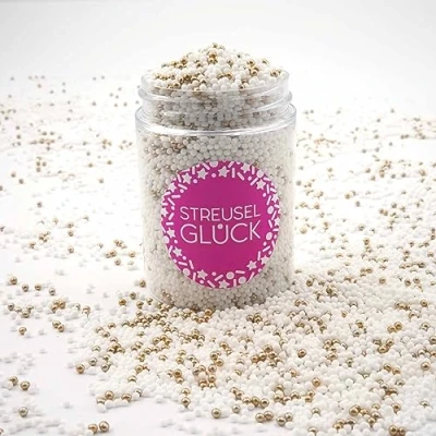 Abbildung von Streusel Glück Just Pure weiss gold 90g Nonpareilles Zuckerperlen Zuckestreusel Kindergeburtstag Weihnachten Tortendeko Cupcakes Muffins Christmas Kuchenstreusel Plätzchen Torte